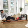 smiling-female-exerciser-on-Row-HX-pulling-0086-1200x1200-1.jpg Life Fitness Row HX Trainer (PH-HOME-ROW-0401)